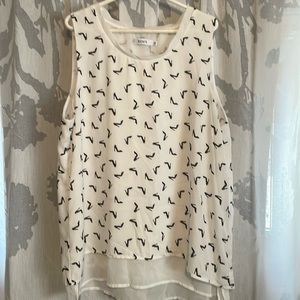 Rickie’s sleeveless top with and underneath shear white top attached …Size large